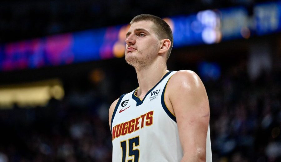 DENVER, CO - MARCH 27: Nikola Jokic #15 of the Denver Nuggets looks on in a game against the Philadelphia 76ers at Ball Arena on March 27, 2023 in Denver, Colorado. NOTE TO USER: User expressly acknowledges and agrees that, by downloading and or using this photograph, User is consenting to the terms and conditions of the Getty Images License Agreement. (Photo by Dustin Bradford/Getty Images)